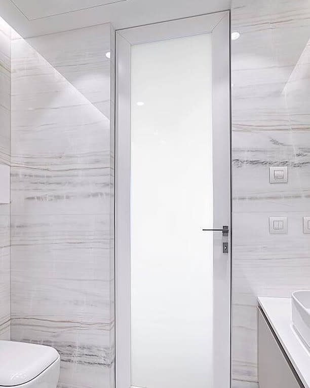 Frameless glass bathroom door