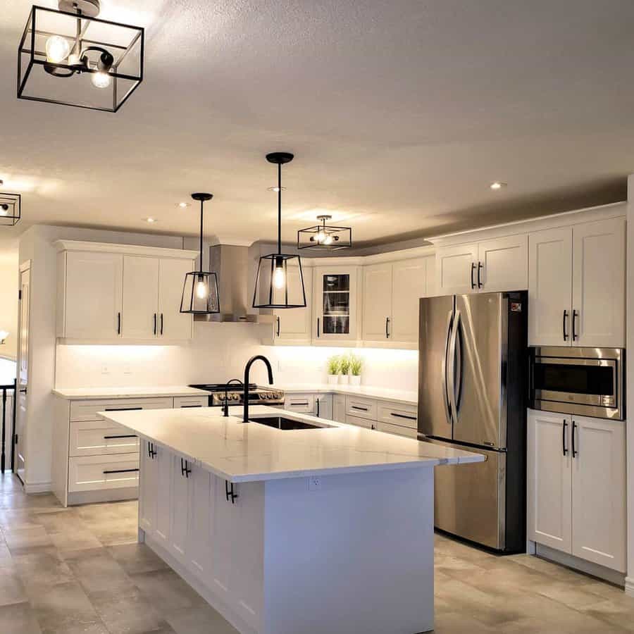 White kitchen with polished marble flooring