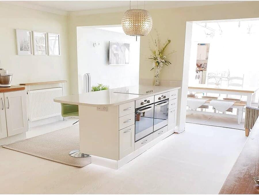 White kitchen with pendant lighting