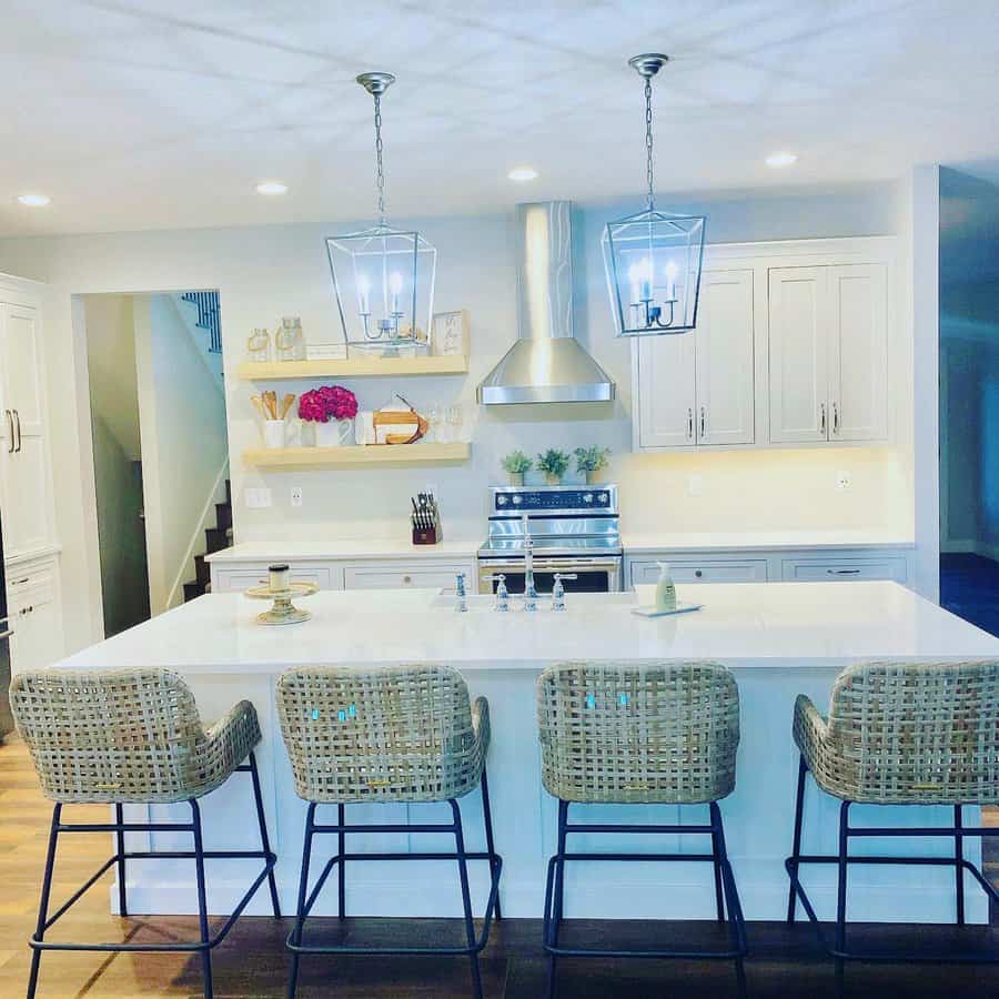 White kitchen with pendant lighting