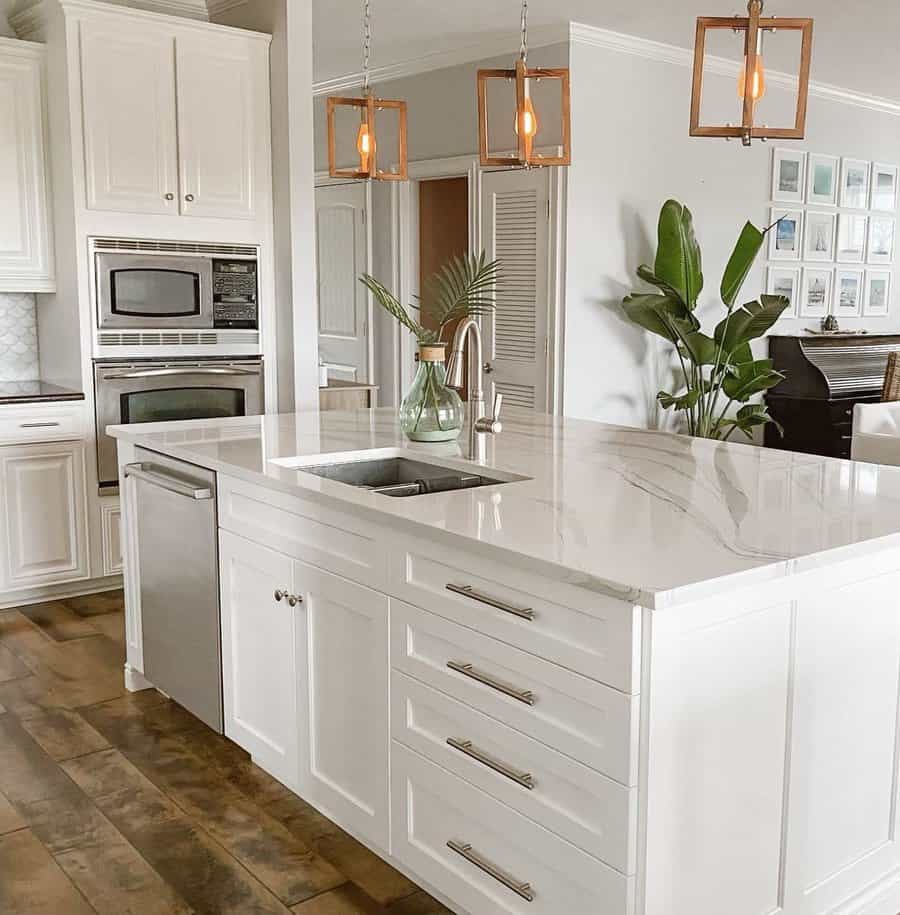 white kitchen with pendant lighting