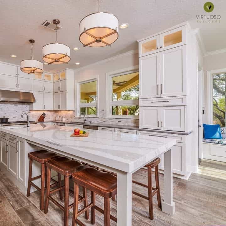 White kitchen with pendant lighting