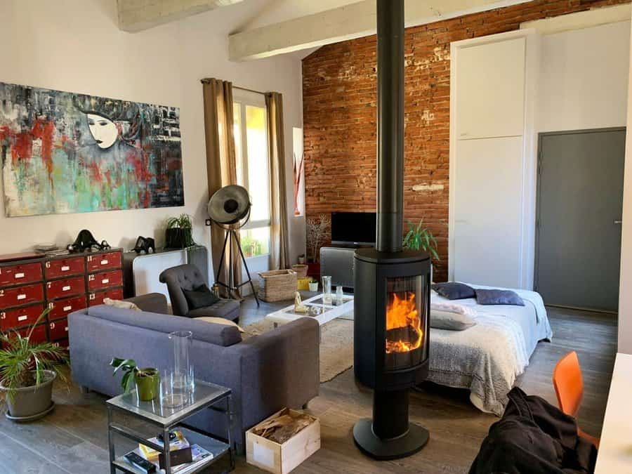 Urban loft living with central stove