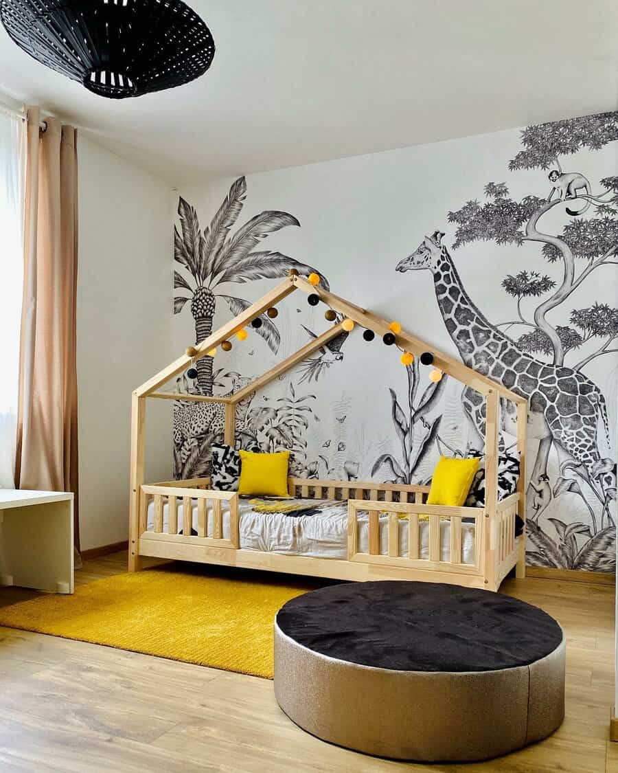 kids jungle themed bedroom with jungle wall mural