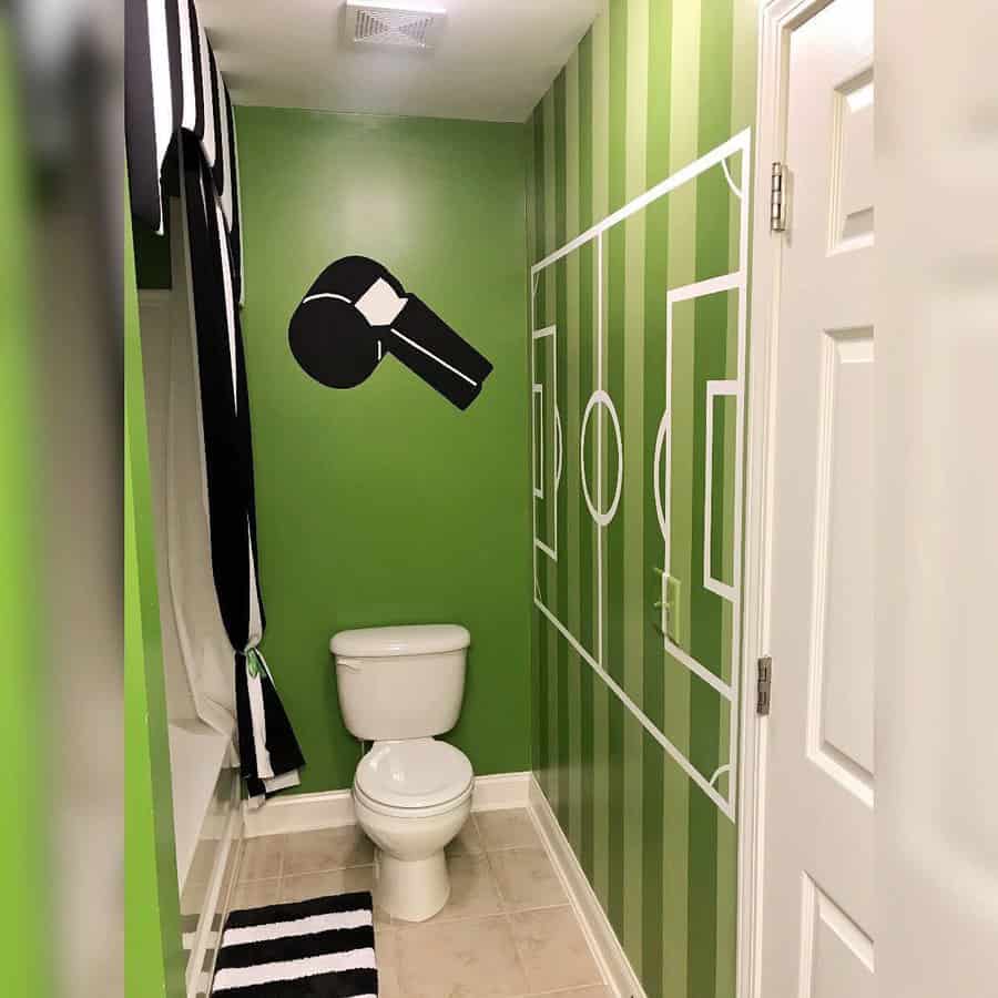 green mural art in bathroom