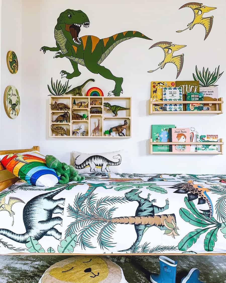 Dinosaur themed bedroom with wall art and toys