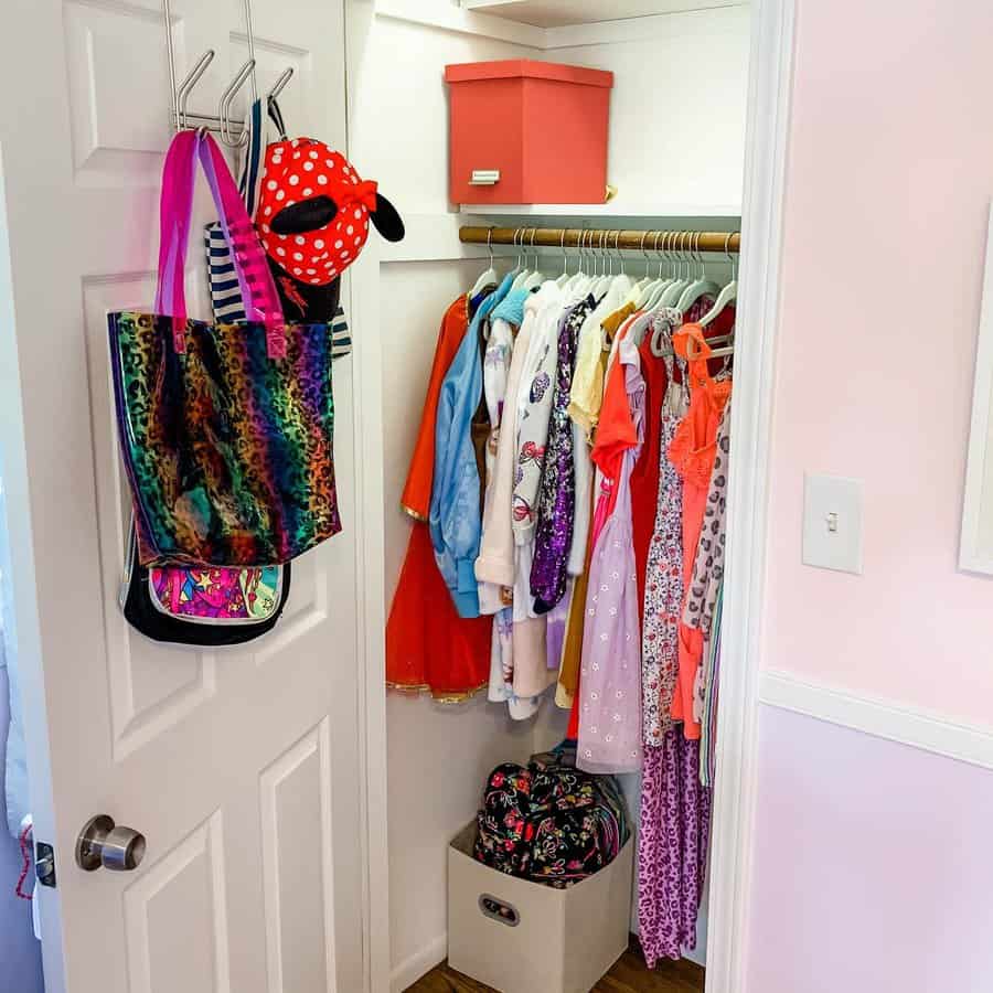 Kids small closet with toy boxes