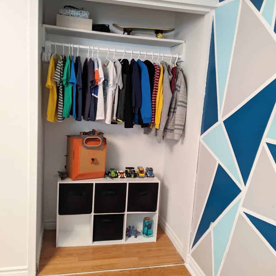 Kids small closet with toy boxes