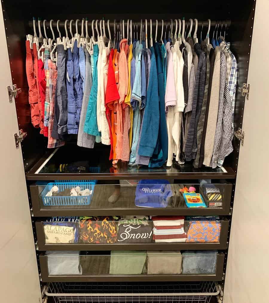small closet with see-through drawers