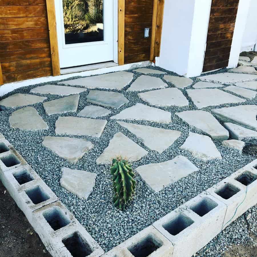 Irregular flagstone pathway with gravel and cactus