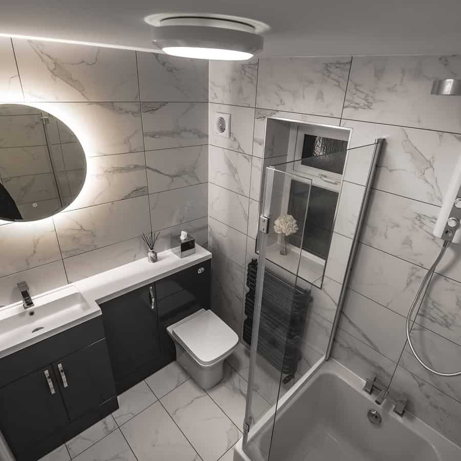 Small bathroom with marble walls