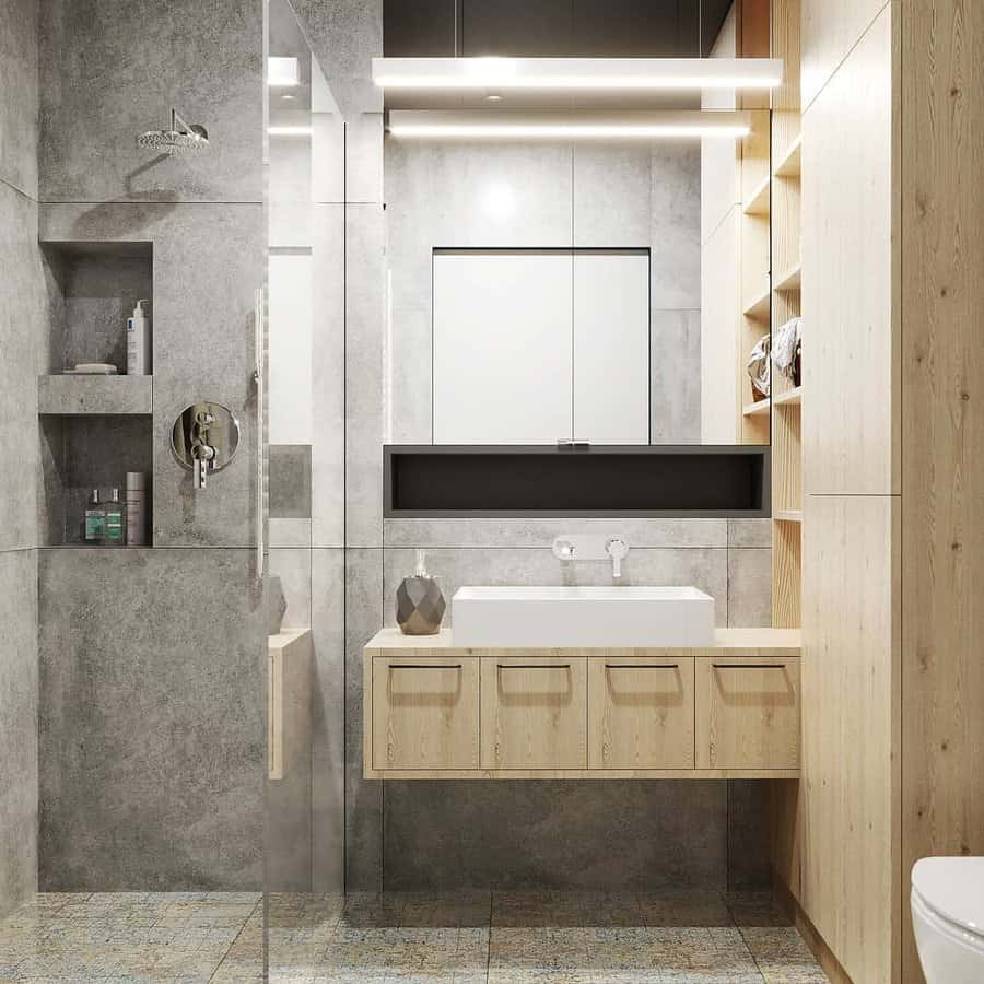 Small bathroom with recessed shelves 