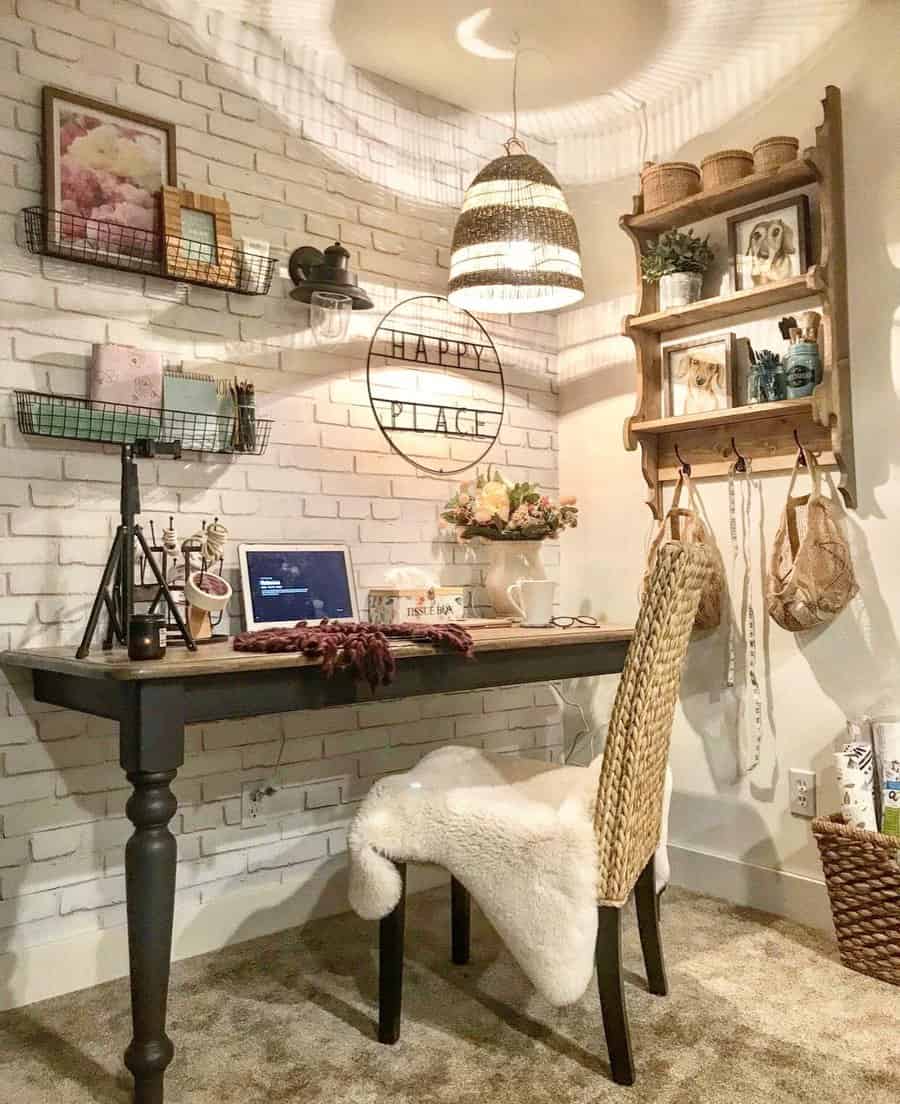 Cozy home office with a wicker chair, sheepskin rug, and laptop on a dark desk; shelves and wall decor create a warm, inviting space