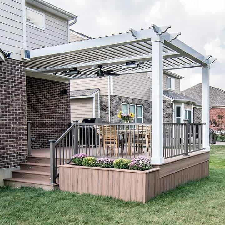 Deck with pergola and planter skirting