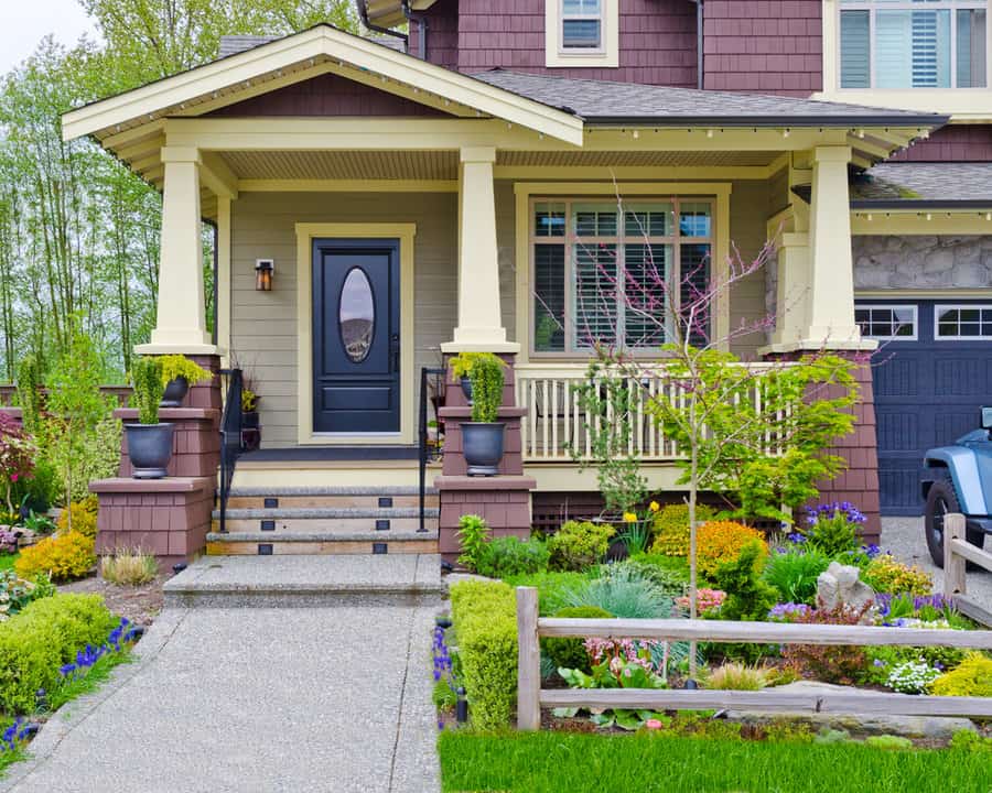 Craftsman house with colorful garden and porch