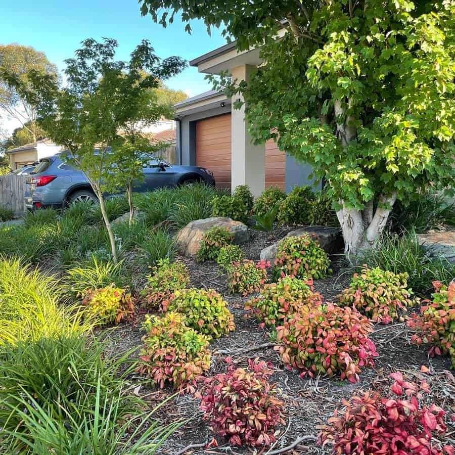 Suburban home with garden and car