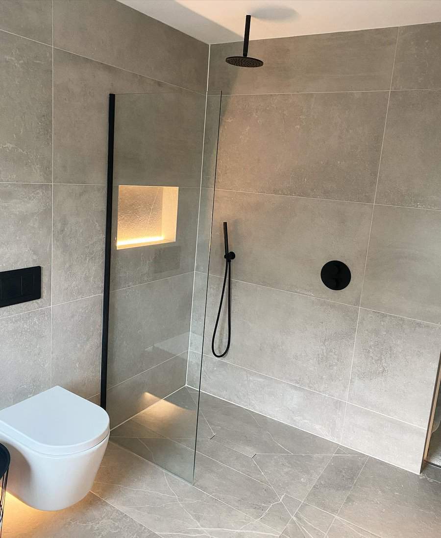 Bathroom shower with concrete tiles