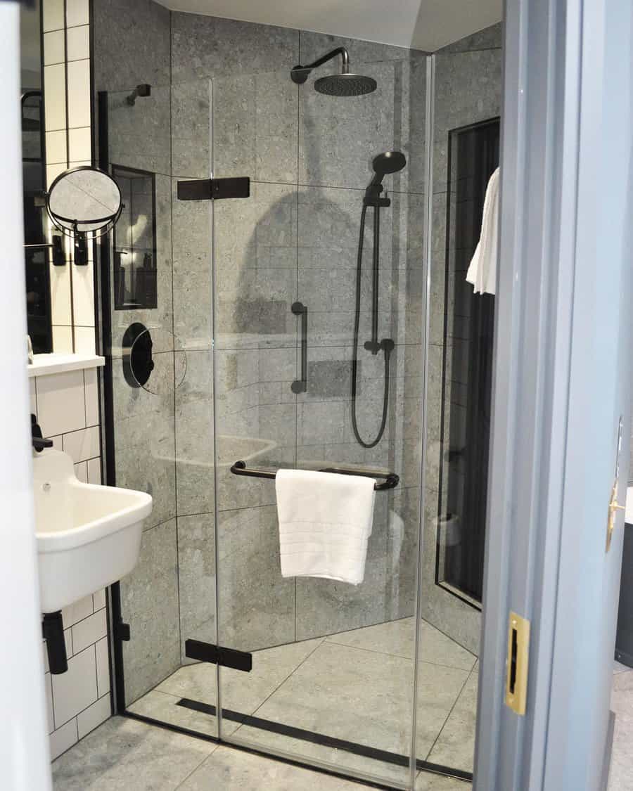 bathroom shower with concrete tiles