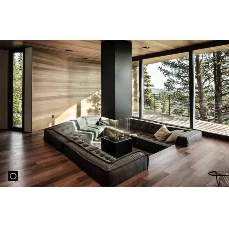 gray living room with wood flooring