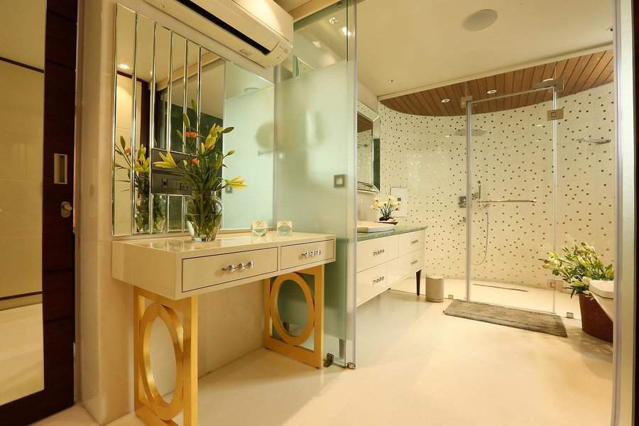 Modern bathroom with artistic vanity and wood accents