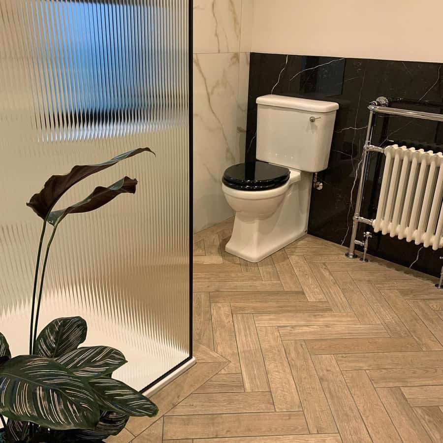 beige bathroom with plants 