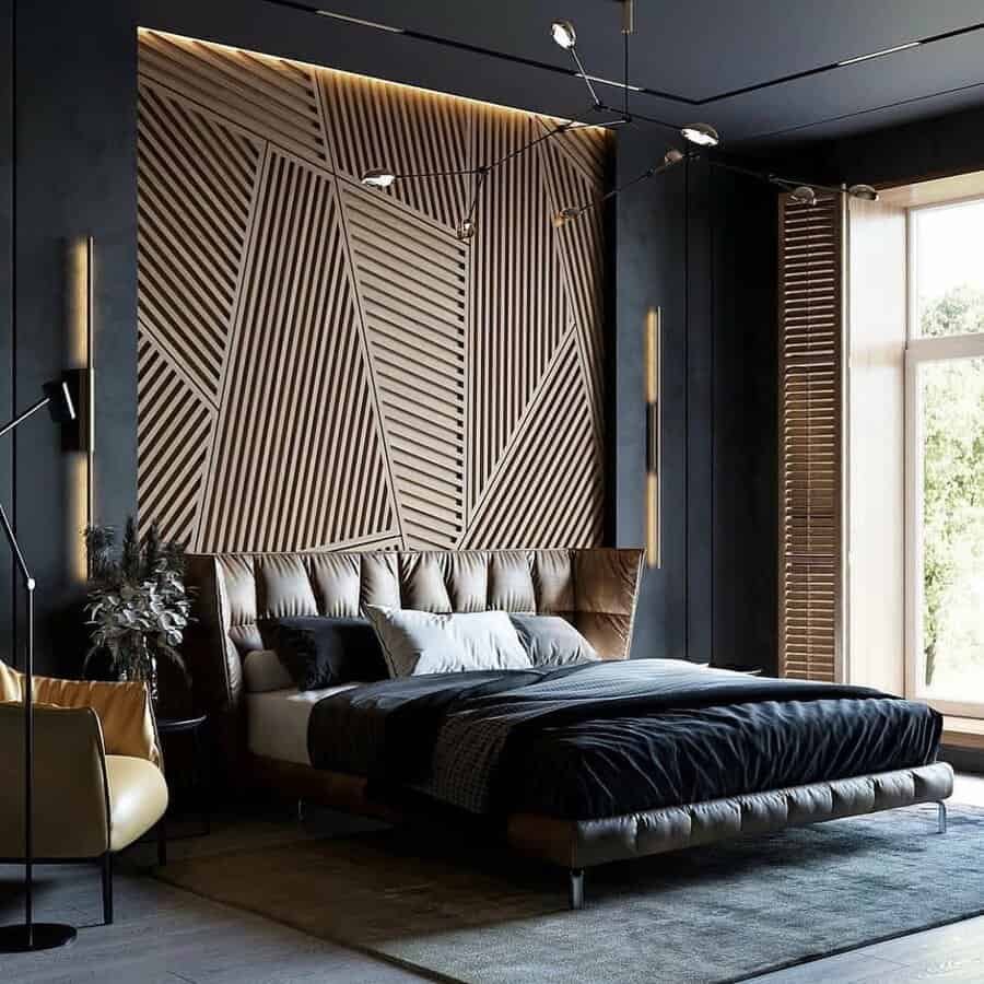 black bedroom with oversized wall art 
