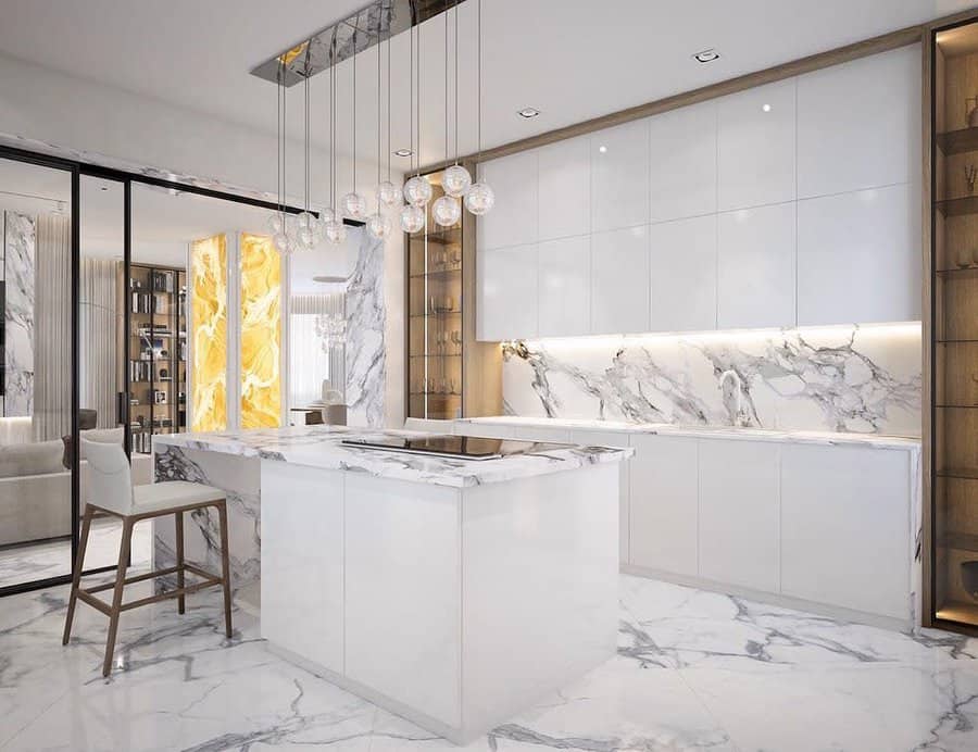 Luxurious kitchen with marble floor and gold accents