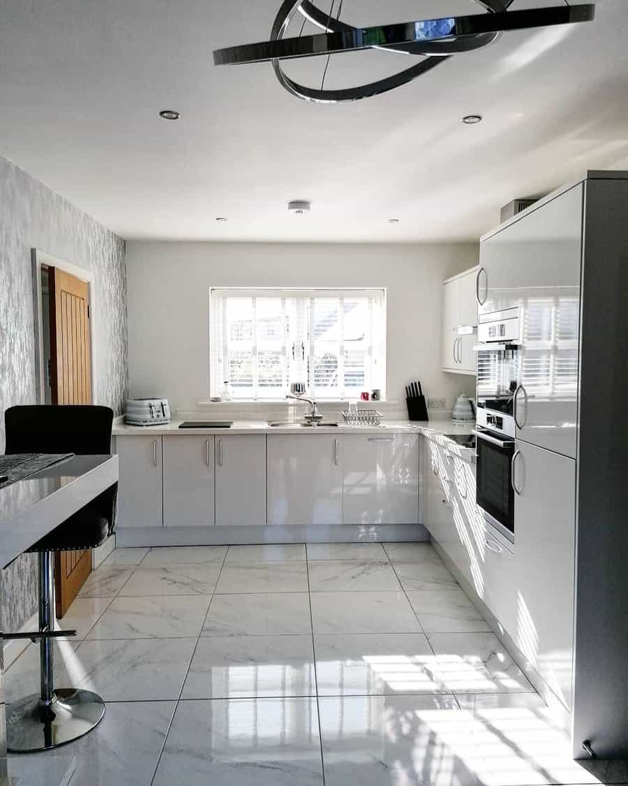 Kitchen With Minimalist Marble Tiles