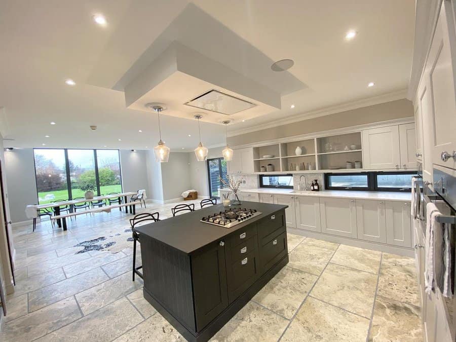 Kitchen with stone floor and garden view