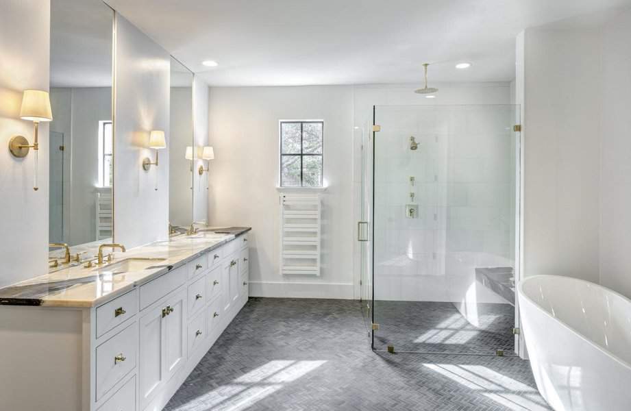 Bright bathroom with vanity and tub