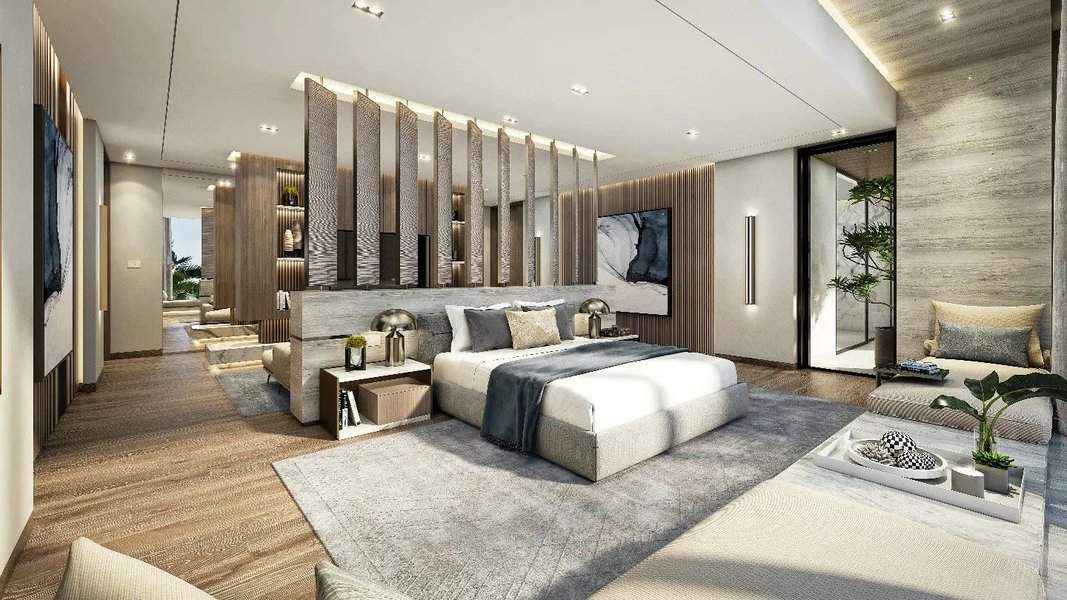 Luxurious master bedroom with textured walls and sitting area