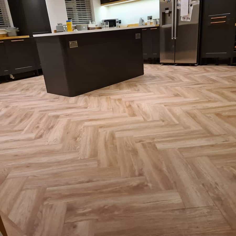 Kitchen With Large Herringbone Pattern Tiles 