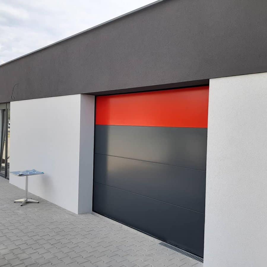 Modern garage with gray and red sectional door