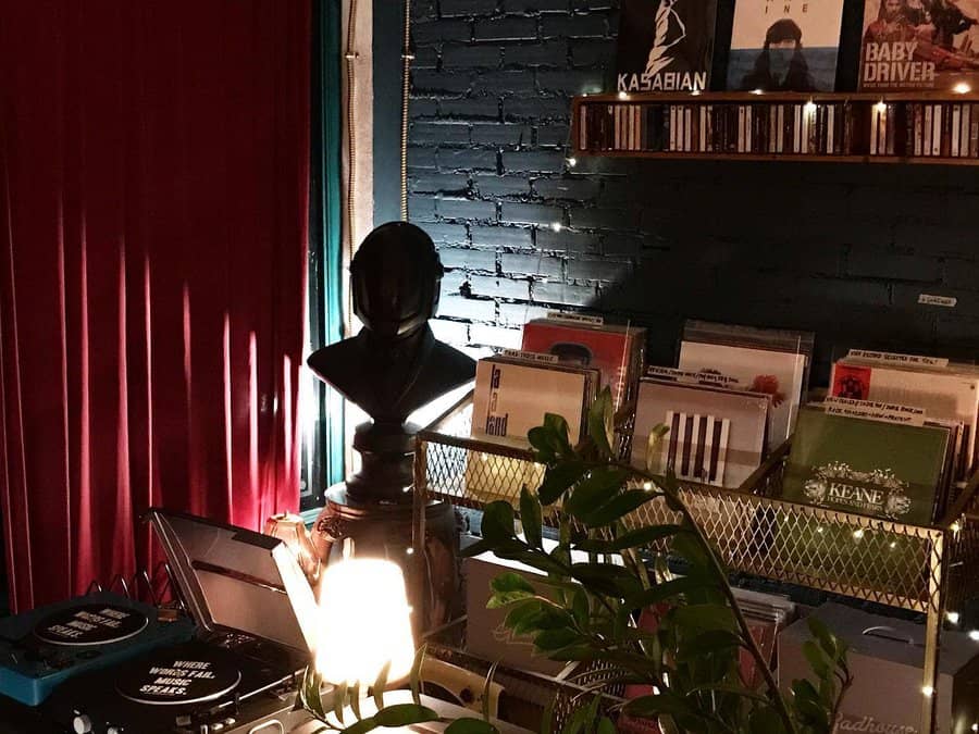 Moody music corner with vinyl records and lamp