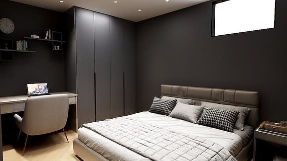 Minimalist bedroom with dark walls and desk area