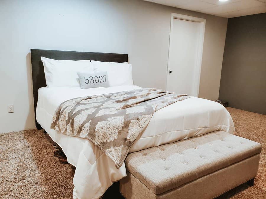 Basement Bedroom With Carpet Flooring