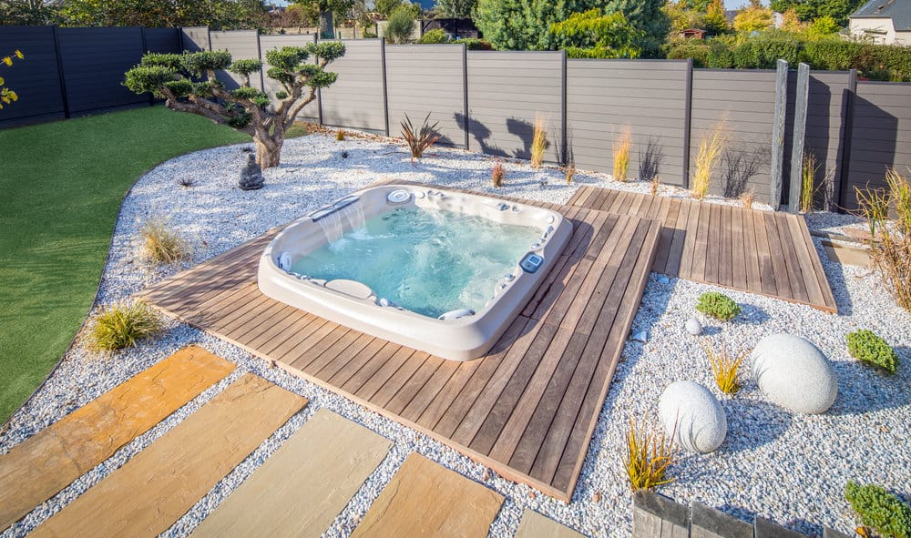 hot tub deck with landscaping
