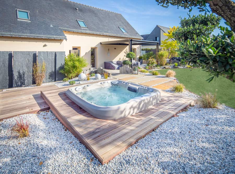 hot tub deck with landscaping