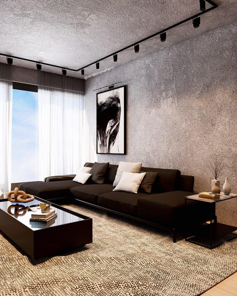 Modern living room with black sofa, abstract art, coffee table, and large window