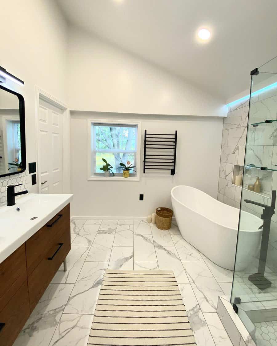 Modern bathroom with marble floor and white tub