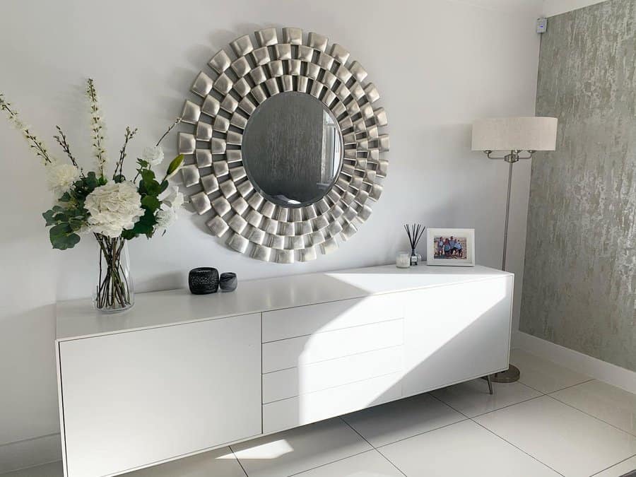 White sideboard with mirror on top