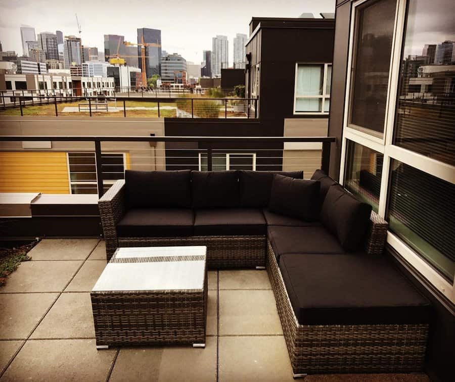 apartment patio with wicker furniture