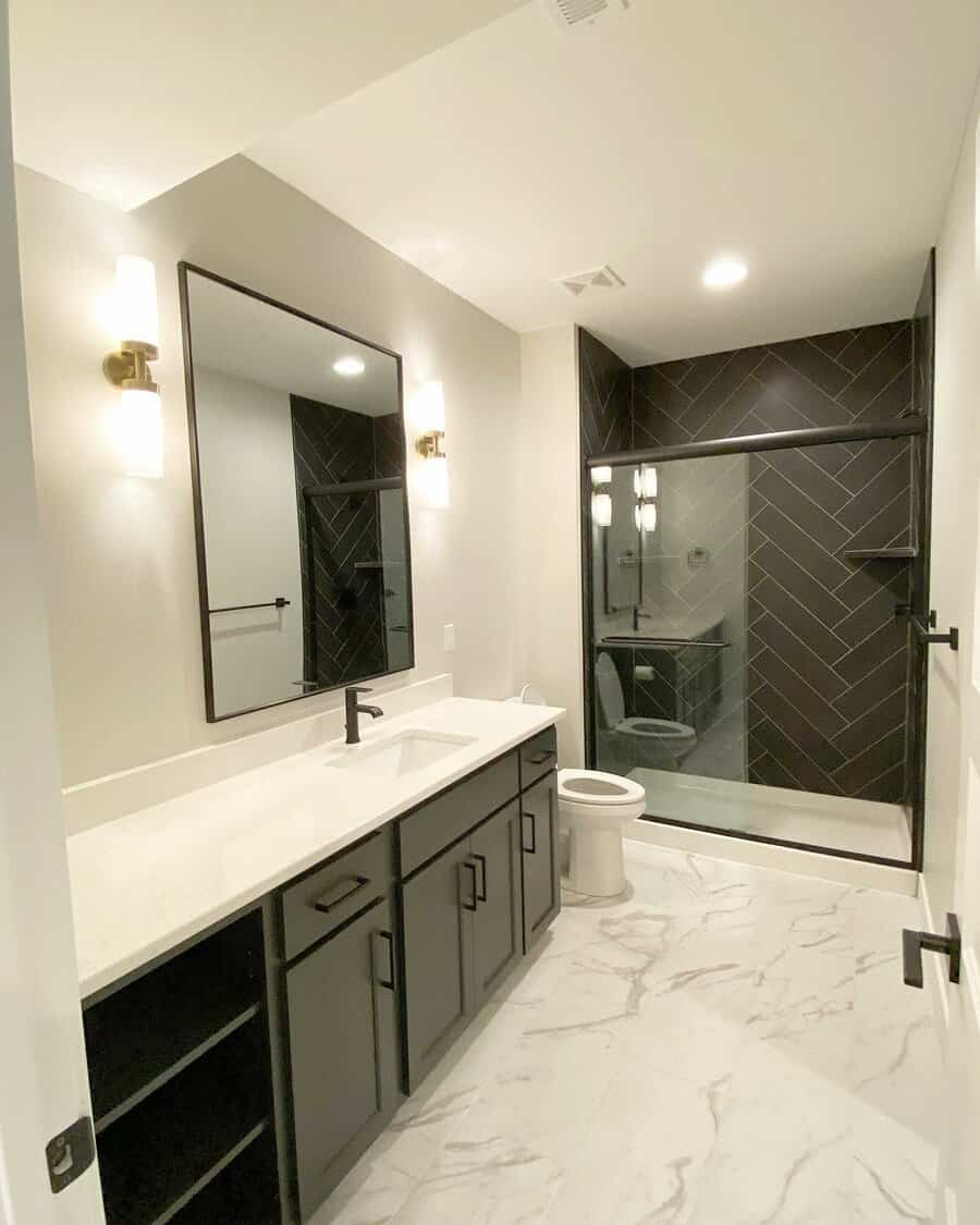 Basement Bathroom With Herringbone Tiles