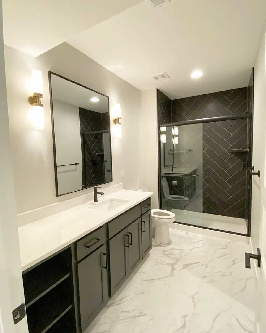 Basement bathroom with herringbone tiles