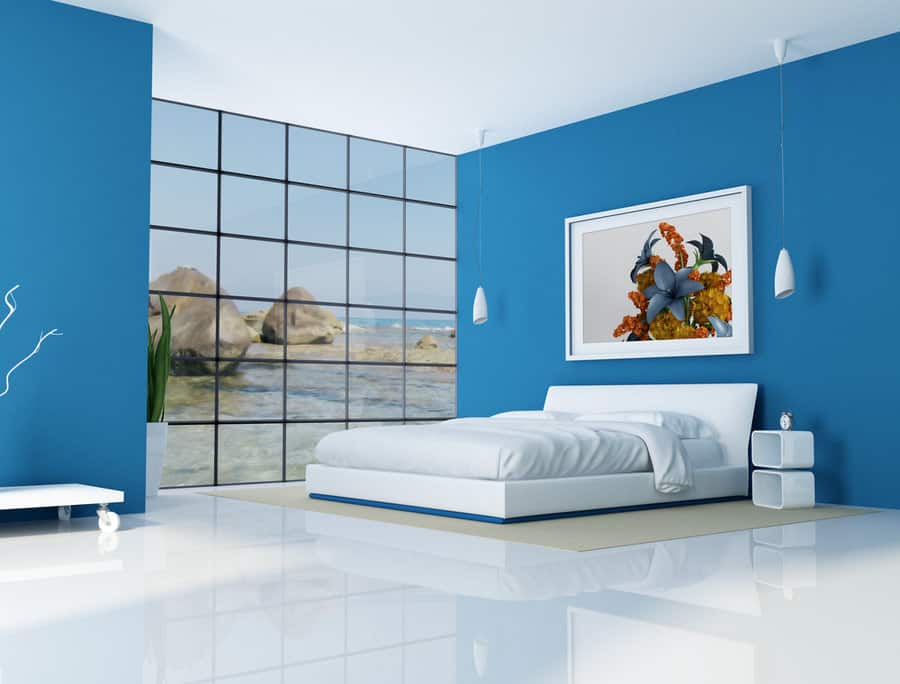 Blue bedroom with full-length glass window