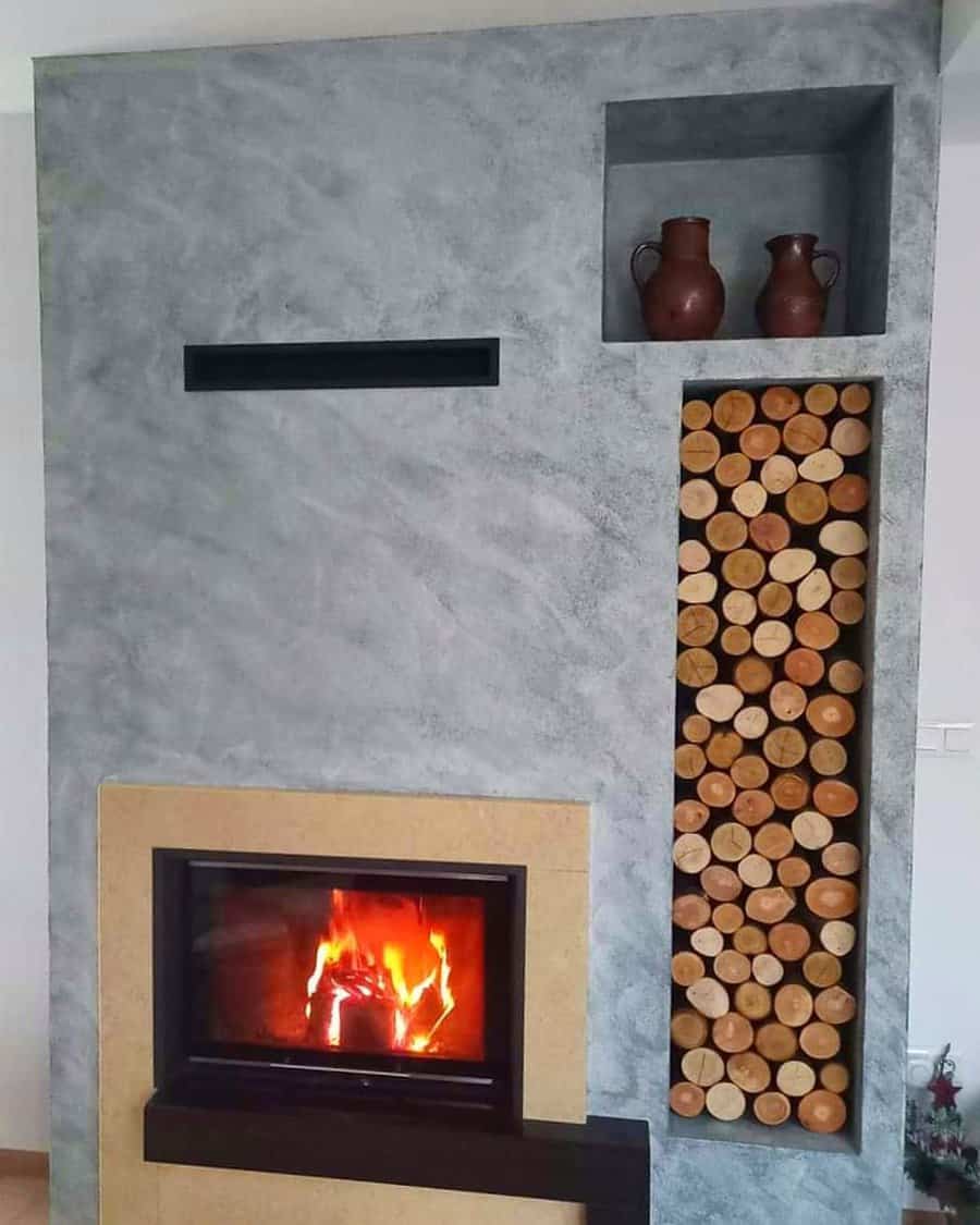 fireplace wall with recessed shelf for logs