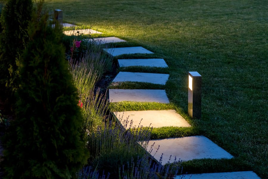 alternating stone and grass garden path