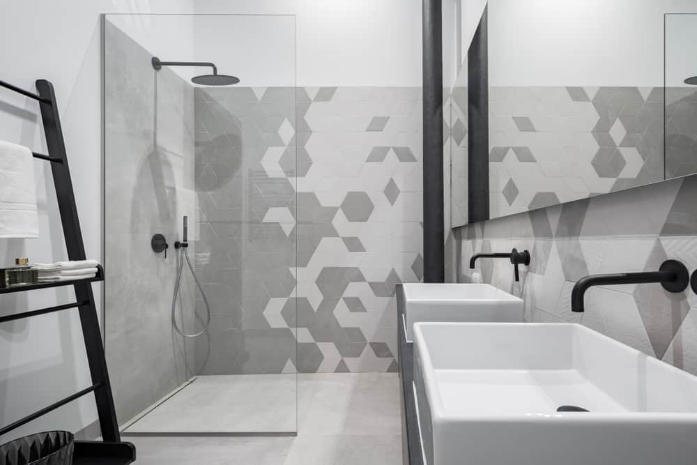 grey bathroom with monochrome decorative tiles