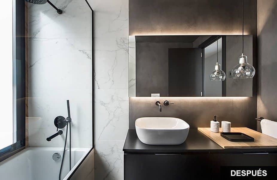 Stylish bathroom with marble shower and basin