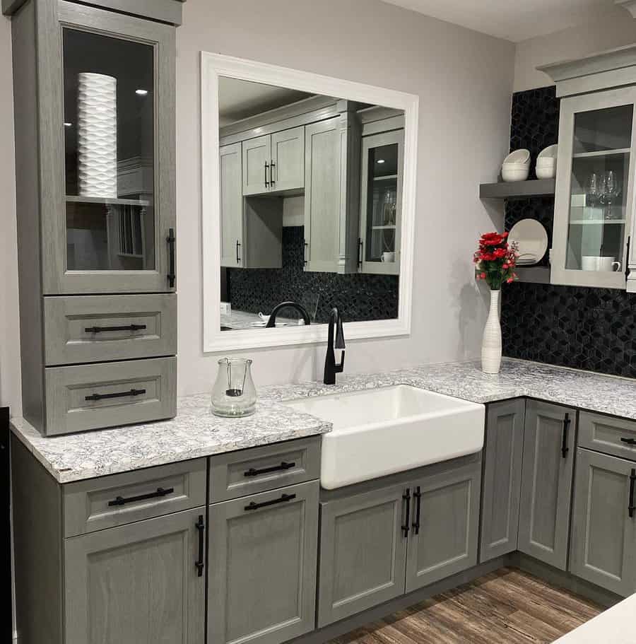 Minimalist kitchen with marble countertop and organized tableware